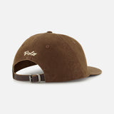 The Cotton Twill Baseball Cap by RALPH LAUREN POLO is shown from the back, displaying white logo embroidery above an adjustable brown leather strap with a metal buckle.