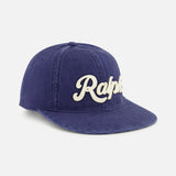 The Cotton Twill Baseball Cap by RALPH LAUREN POLO is a classic navy accessory, featuring “Ralph” elegantly embroidered in white cursive across the front. Designed for both style and comfort, it includes a premium leather strap at the back for an adjustable fit and is displayed on a plain white background to highlight its timeless appeal.