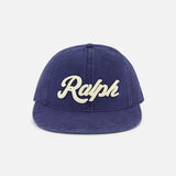 Crafted by RALPH LAUREN POLO, the Cotton Twill Baseball Cap showcases “Ralph” in bold, cream-colored cursive across the front and features a classic leather strap for adjustable comfort.