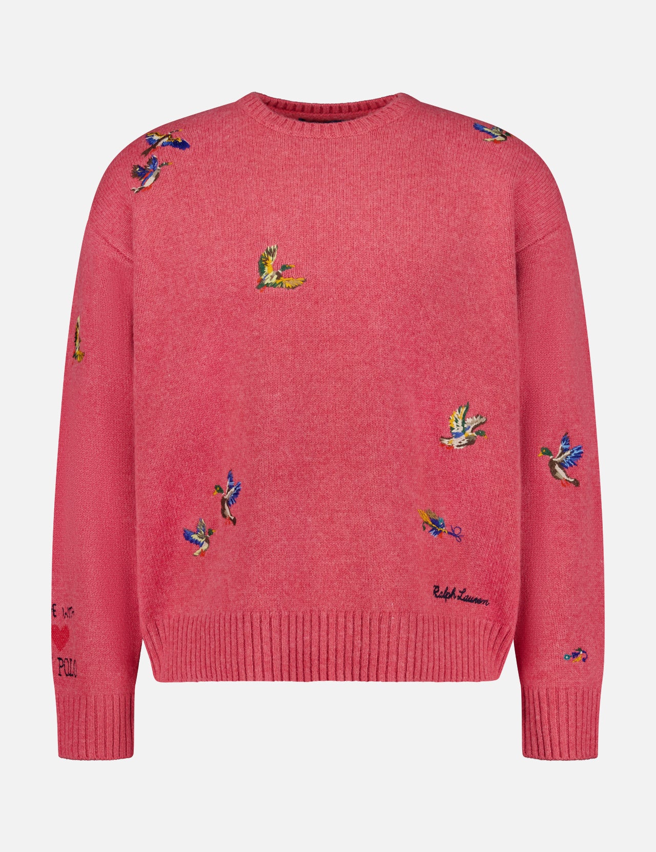 The Ducks Fly Crewneck Sweater by RALPH LAUREN POLO is a pink wool alpaca blend featuring vibrant embroidered ducks across the front, sleeves, and shoulders, complete with ribbed cuffs, hem, and a classic crew neckline for rustic charm.