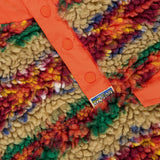 Ralph Lauren Polo Fairisle Snap Mockneck Pullover Sweater in a high-pile fleece with a snap-button placket and a multicolored Fair Isle print.