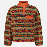 Ralph Lauren Polo Fairisle Snap Mockneck Pullover Sweater in high-pile fleece with a multicolored Fair Isle print, an orange snap-button placket, and a chest pocket.