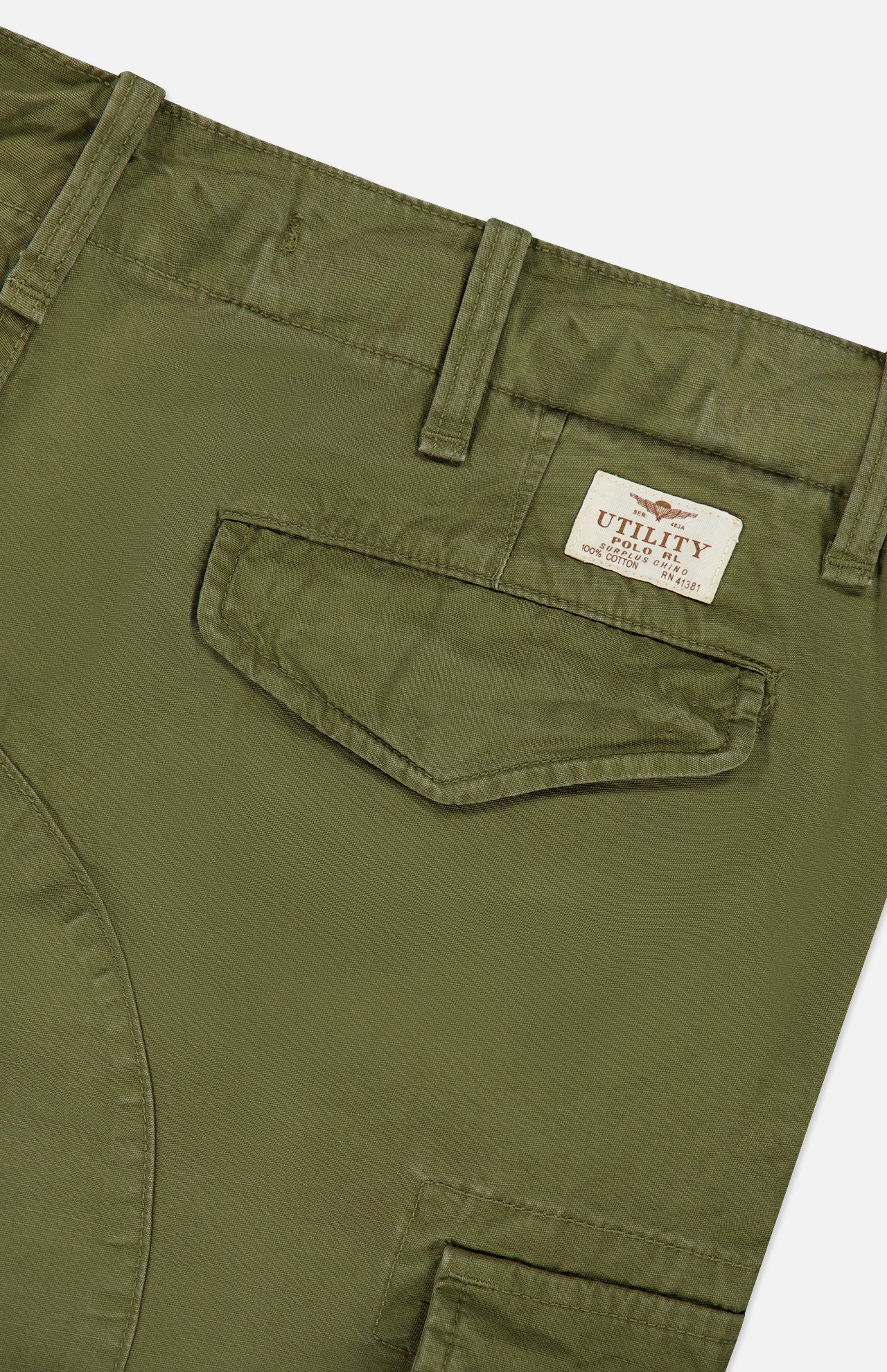 Olive green cotton canvas Lightweight Rustic Canvas Cargo Pant by Ralph Lauren Polo featuring a flap pocket and a rectangular patch label that reads Utility and 100% Cotton.