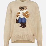 Beige Cotton Crewneck Polo Bear Sweater featuring an intarsia-knit bear wearing sunglasses, a shearling-lined jacket, and boots.