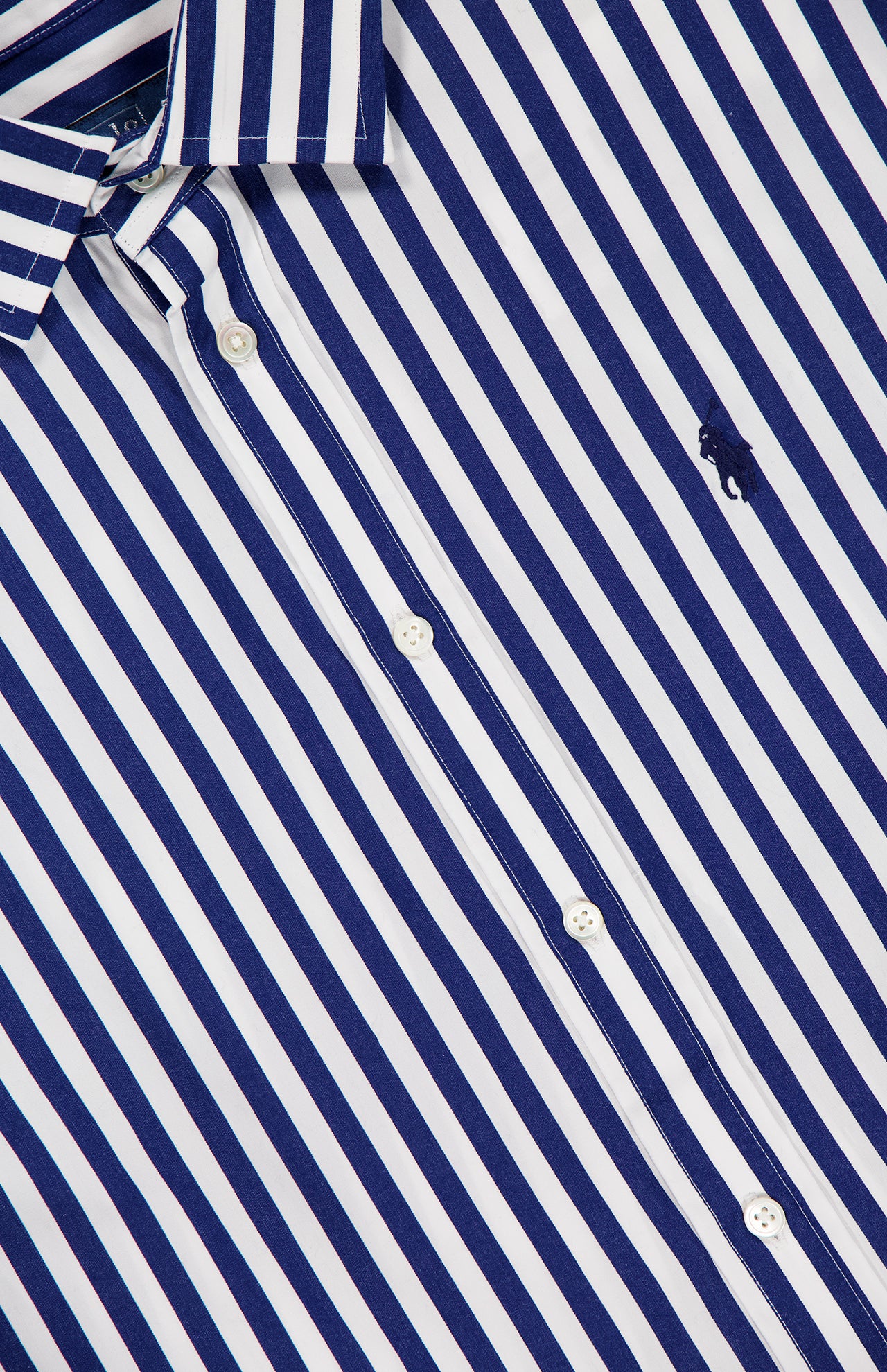 Close-up of the RALPH LAUREN POLO Cotton Long Sleeve Blouse in blue stripes, with a relaxed fit, white buttons, and an embroidered Pony logo on the chest.