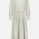 Off-white Italian carded-wool Crepe Woven Turtleneck A-Line Dress featuring a ribbed turtleneck, long sleeves, and a gathered waist.