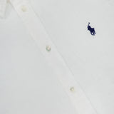 A white Linen Long Sleeve Button Front Shirt by RALPH LAUREN POLO, featuring the signature navy blue embroidered polo player logo on the chest.