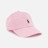 The RALPH LAUREN POLO Twill Logo Cap is a light pink cotton chino cap with a curved brim and an embroidered Pony logo on the front, shown against a white background.