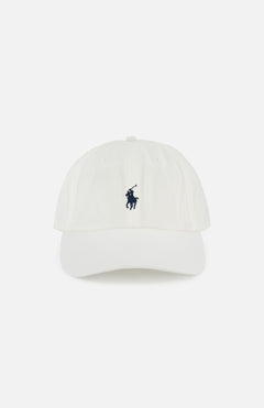 The Twill Logo Cap by RALPH LAUREN POLO is a classic white cotton chino hat with a curved brim and visible stitching, featuring a navy embroidered Polo player logo on the front.