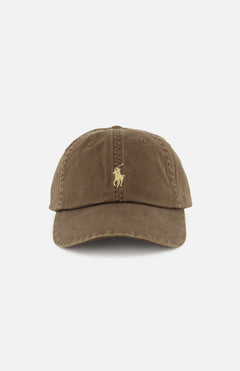 A brown RALPH LAUREN POLO Twill Sport Cap with visible stitching and a small yellow embroidered horse and rider logo on the front, photographed against a plain white background.