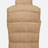 The Wool Cashmere Sweater Vest by RALPH LAUREN POLO is shown from the back, featuring a high collar and horizontal quilted sections. Its tan cable-knit texture highlights a repeating cable pattern throughout the fabric.