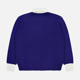 A RALPH LAUREN POLO Wool Long Sleeve Polo Collar Sweater in royal blue, featuring white ribbed cuffs and a white ribbed collar, is displayed flat on a white background with the back view shown.