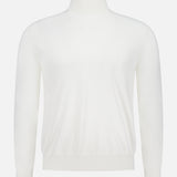 The Cotton Jersey Turtleneck Sweater by RALPH LAUREN PURPLE LABEL is a plain white long-sleeve cotton jersey with a fitted neckline, ribbed cuffs and hem, shown on a white background.