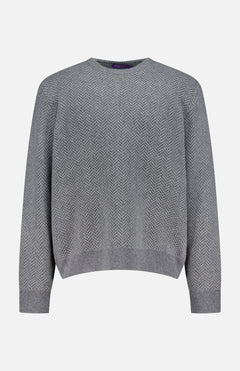 The Herringbone Textured Crewneck Sweater by RALPH LAUREN PURPLE LABEL features a gray cashmere knit with a subtle herringbone pattern, ribbed cuffs, hem, and neckline. Made in Italy and shown against a white background.
