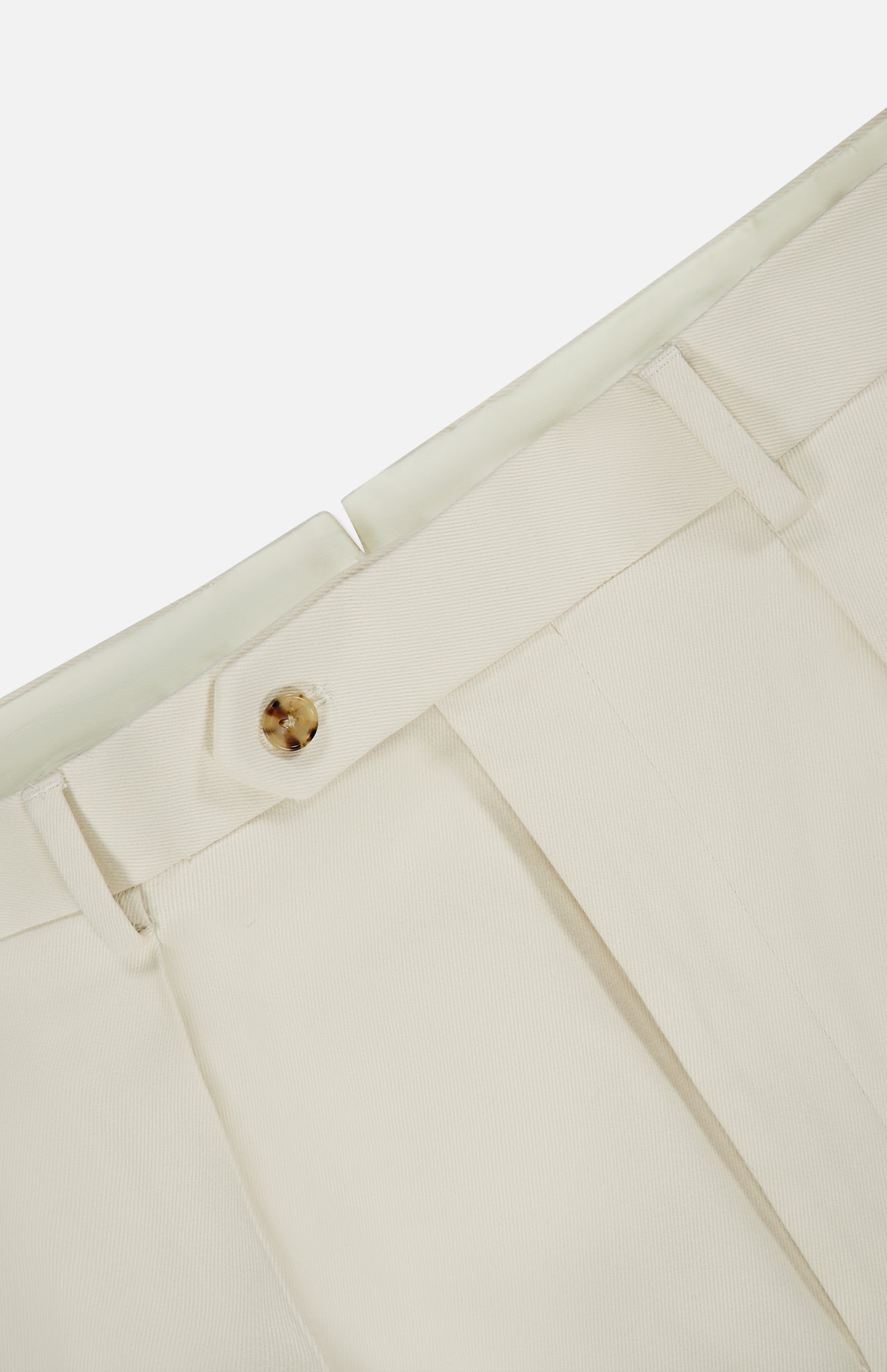 Off-white Ralph Lauren Purple Label Brushed Cotton Pleated Trouser Pants featuring a button-tab waistband, belt loops, and a cotton cashmere blend.