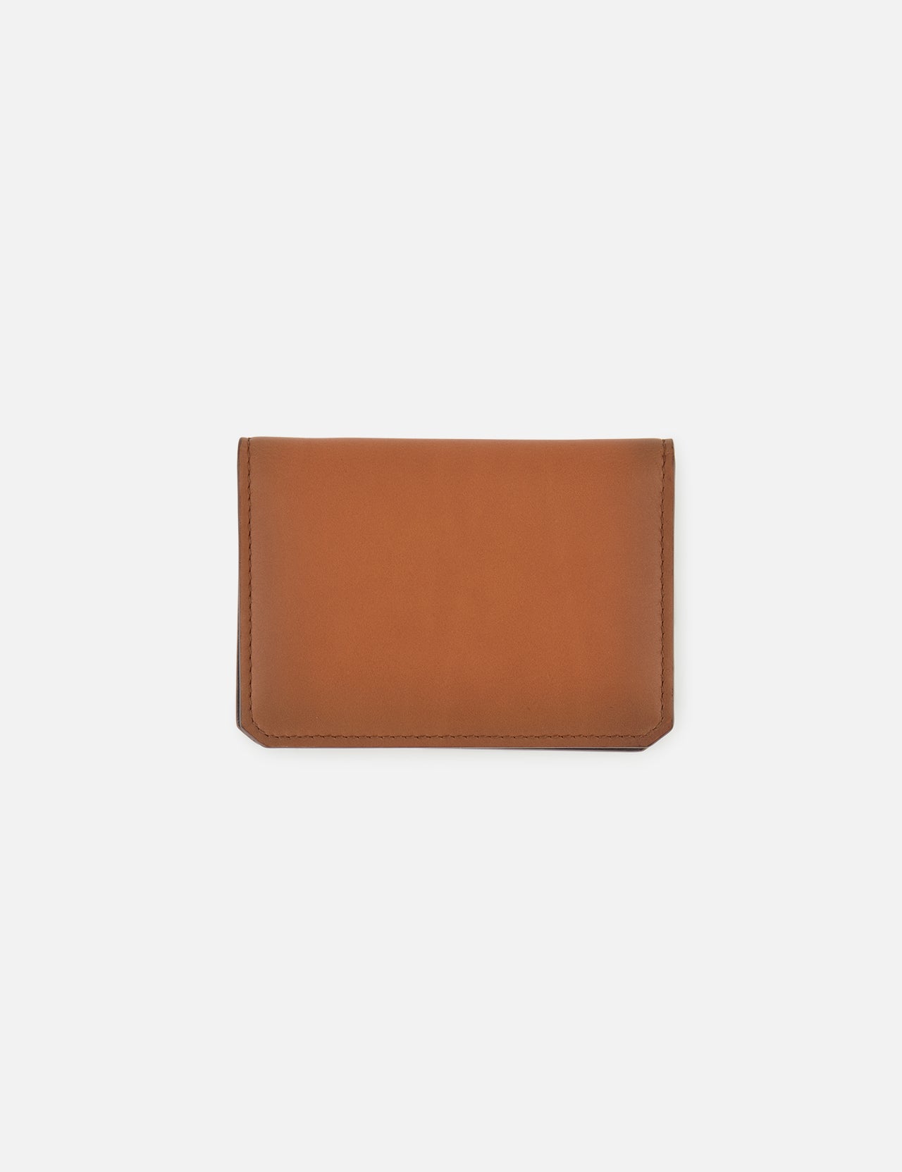 The Burnish Calf Wallet from RALPH LAUREN PURPLE LABEL, crafted in brown calfskin with a simple rectangular design, lies flat on a plain white background, showcasing a timeless accessory that embodies understated elegance.