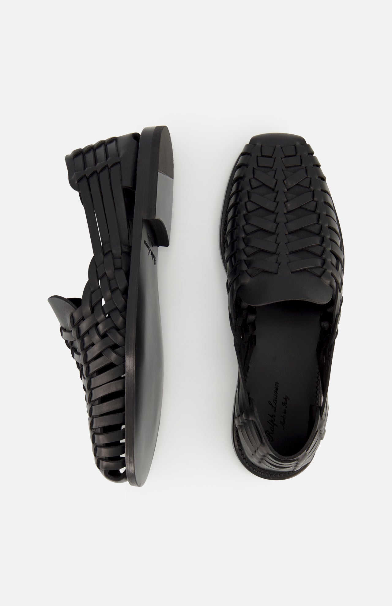Two Burnished Vacchetta Casual Loafers by RALPH LAUREN PURPLE LABEL, made in Italy, are displayed on a light background—one top view and one side view—showcasing their refined design and elegant slip-on silhouette.