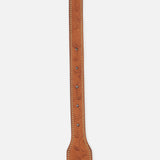 Ralph Lauren Purple Label Western Vacchetta Belt in light brown leather with a patterned texture, contrast stitching, and intricate metal hardware featuring a floral design on the tip.
