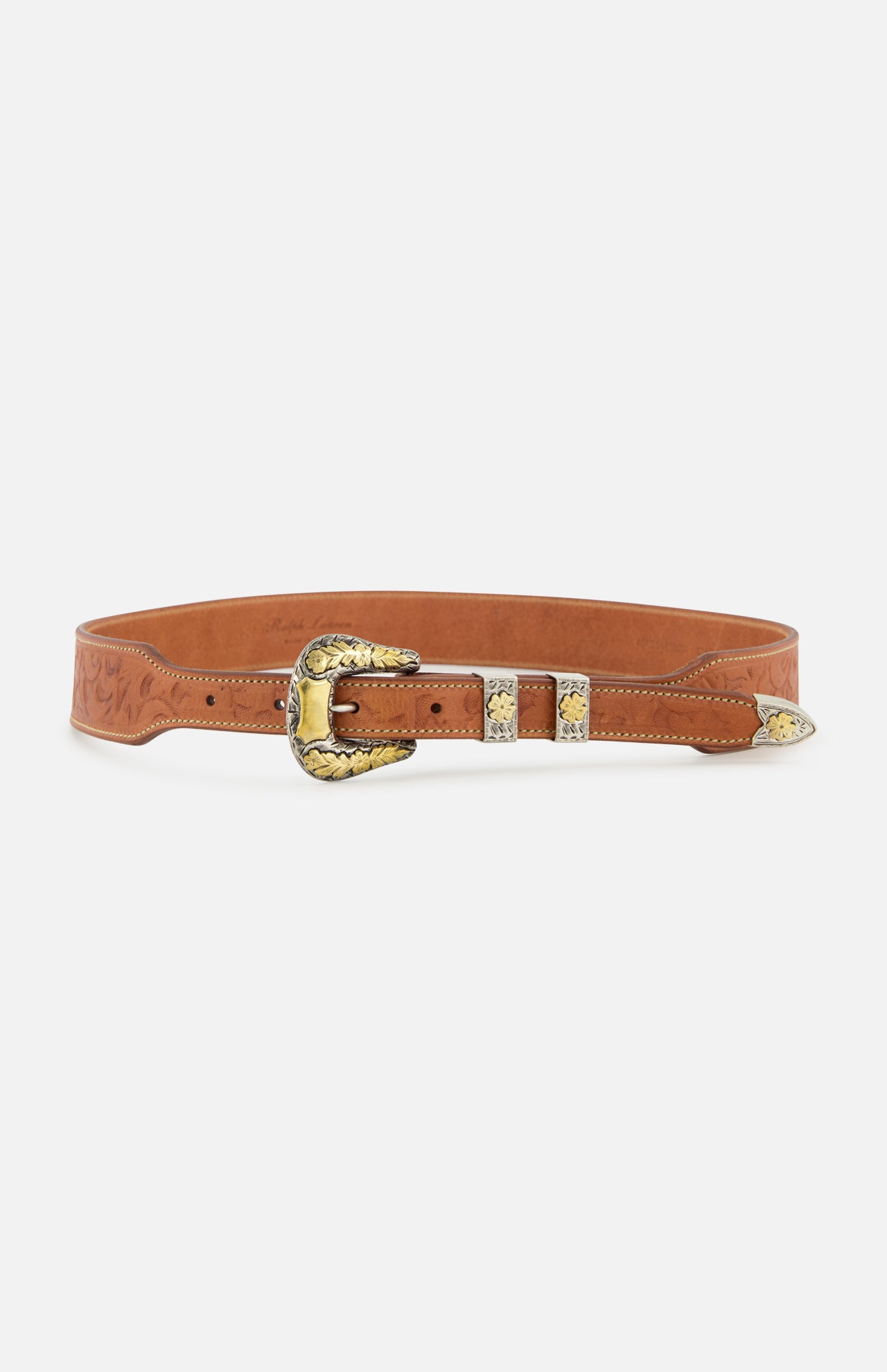 Ralph Lauren Purple Label Western Vacchetta Belt in tan leather, featuring embossed floral patterns and an intricate gold and silver-toned engraved buckle, keeper, and tip.