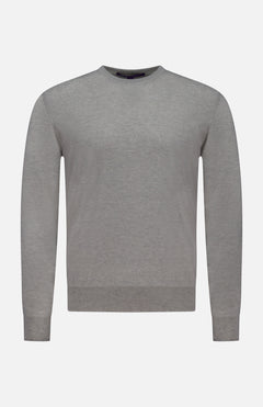 The RALPH LAUREN PURPLE LABEL Cashmere Crewneck Pullover Sweater, shown against a white background, features a plain light gray design with ribbed cuffs, hem, and collar. Expertly crafted in Italy, this long-sleeve sweater offers timeless simplicity and elegance.