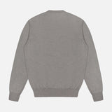 A plain grey Cashmere Crewneck Pullover Sweater by RALPH LAUREN PURPLE LABEL is shown from the back, featuring long sleeves, ribbed cuffs, and a ribbed waistband against a white background. Expertly made in Italy for timeless quality and comfort.