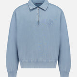 Introducing the RALPH LAUREN PURPLE LABEL Cashmere Long Sleeve Quarter Zip Polo Sweatshirt in pale blue. This men’s casual sweatshirt showcases a half-zip collar, ribbed cuffs and hem, and a refined embroidered logo on the left chest. Crafted from a soft cotton cashmere blend, this pullover offers a comfortable, relaxed fit that’s ideal for everyday wear.
