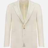 The RALPH LAUREN PURPLE LABEL Cotton Panama Weave Double Breasted Sportcoat, in light beige, is made in Italy and shown on a plain white background.