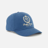 The Cotton Twill Crown Hat by RALPH LAUREN PURPLE LABEL is a dark blue ball cap with an embroidered white crest—highlighting a crown, laurel wreath, and the letters “RL.” Beneath the crest, it reads “Ralph Lauren Speed Club.” The stylish cap is displayed against a white background.