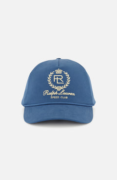 The Cotton Twill Crown Hat by RALPH LAUREN PURPLE LABEL is a dark blue ball cap expertly crafted in Italy. Featuring a curved brim, this hat showcases an embroidered crest with the letters “RL,” a crown, laurel wreath, and the words “Ralph Lauren Speed Club” in gold on the front—capturing the classic style and superior craftsmanship of Ralph Lauren.