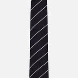The RALPH LAUREN PURPLE LABEL Faille Stripe Silk Tie, crafted in Italy, features a black silk design with thin white diagonal stripes and is showcased against a simple light background.