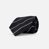 The Faille Stripe Silk Tie by RALPH LAUREN PURPLE LABEL, crafted in Italy from black silk with thin diagonal white stripes, is shown rolled up against a plain white background.
