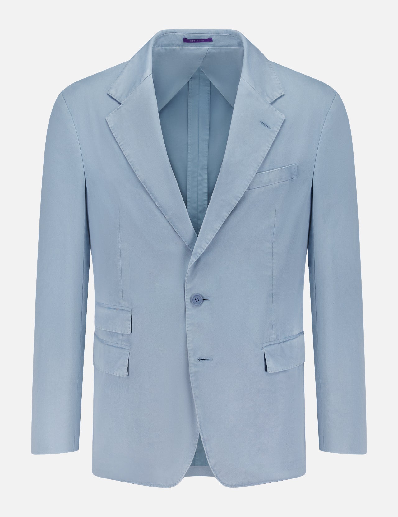 The Garment Dyed Cotton Single Breasted Sportcoat by RALPH LAUREN PURPLE LABEL is a light blue men’s blazer featuring notch lapels, a single button closure, and three front pockets. Hand tailored in Italy from premium stretch chino fabric for comfort and vintage character, it is displayed on a white background.