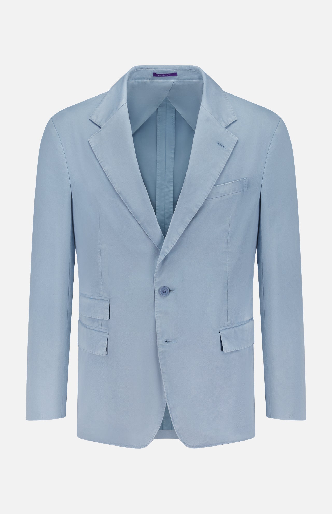 The Garment Dyed Cotton Single Breasted Sportcoat by RALPH LAUREN PURPLE LABEL is a light blue men’s blazer featuring notch lapels, a single button closure, and three front pockets. Hand tailored in Italy from premium stretch chino fabric for comfort and vintage character, it is displayed on a white background.
