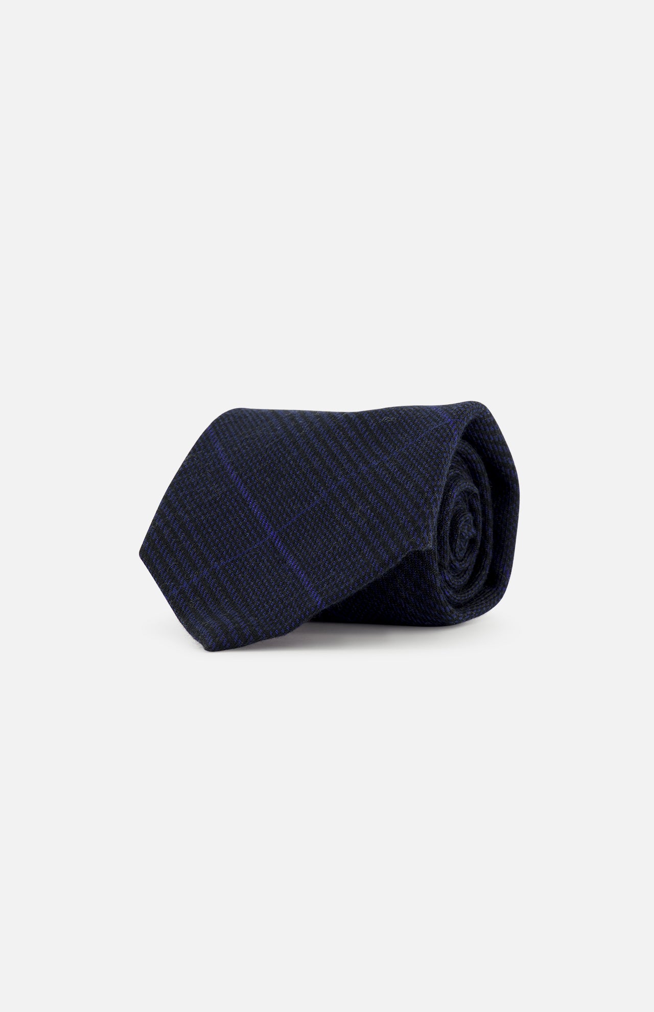 A navy and black Glenplaid Check Woven Tie by RALPH LAUREN PURPLE LABEL, rolled up on a white background.