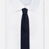 A folded white dress shirt with a dark navy blue RALPH LAUREN PURPLE LABEL Glenplaid Check Woven Tie.