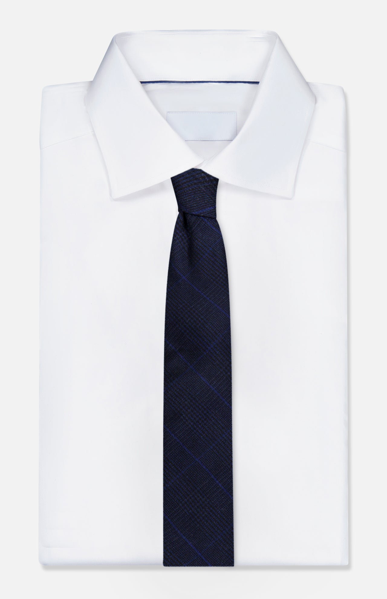 A folded white dress shirt with a dark navy blue RALPH LAUREN PURPLE LABEL Glenplaid Check Woven Tie.