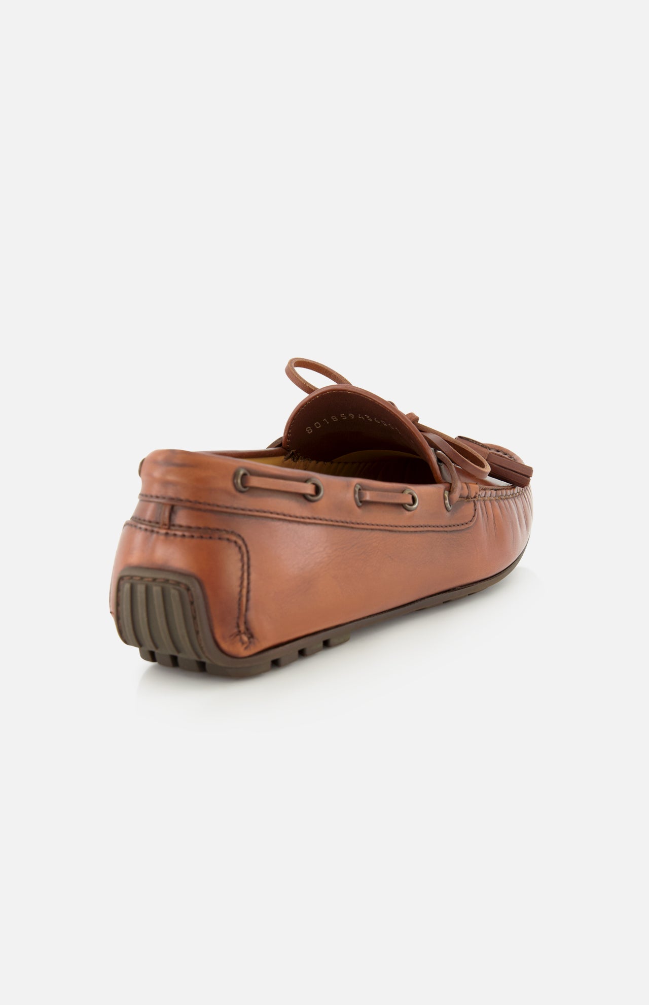The Harold Hand Burnished Tassle Loafer by RALPH LAUREN PURPLE LABEL is a brown leather shoe crafted from premium French box calfskin, showcasing visible stitching, a rubber sole, and tassel lace accents, displayed from the rear side against a white background.