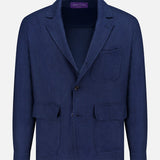 The Herringbone Single Breasted Sportcoat from RALPH LAUREN PURPLE LABEL is an Italian hand-tailored jacket in navy blue, featuring a notched lapel, one chest pocket, two front flap pockets, and a two-button front closure. The sportcoat is expertly crafted and displayed against a white background.