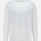 The Journey Twill Long Sleeve Dress Shirt by RALPH LAUREN PURPLE LABEL is expertly crafted in Italy from premium cotton twill, featuring long sleeves, a button-down front, and a pointed collar—all showcased against a plain white background.