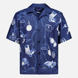 The RALPH LAUREN PURPLE LABEL Printed Silk Short Sleeve Sport Shirt is a navy blue, button-up camp shirt made from silk, adorned with white illustrations of gloves, vintage cars, a stopwatch, goggles, and car keys.