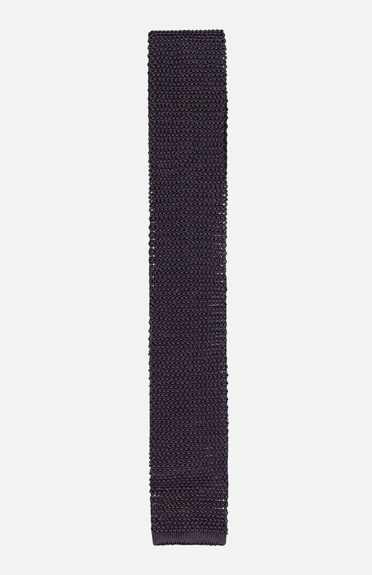 The Superknit Silk Tie by RALPH LAUREN PURPLE LABEL, crafted in Italy, features a dark navy blue hue with a textured knit pattern and is displayed laid flat on a white background.