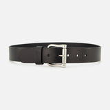 Showcased on a white background, the Vacchetta Leather Belt by RALPH LAUREN PURPLE LABEL is crafted from black leather and features a silver metal buckle. Expertly made in Italy, the belt is laid flat to highlight its sleek design and three adjustment holes.