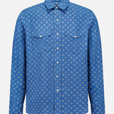 The Western Wendover Bandana Sport Shirt by RALPH LAUREN PURPLE LABEL is an indigo blue, long-sleeve western-style shirt with two chest pockets and a subtle white geometric pattern, shown against a plain white background.