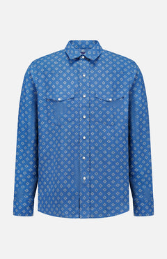 The Western Wendover Bandana Sport Shirt by RALPH LAUREN PURPLE LABEL is an indigo blue, long-sleeve western-style shirt with two chest pockets and a subtle white geometric pattern, shown against a plain white background.