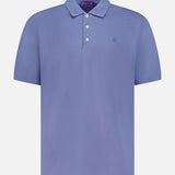 The RALPH LAUREN PURPLE LABEL Pique Short Sleeve Polo Shirt in light purple features a collar, three white buttons, and a small embroidered logo on the left chest, shown on a plain white background.