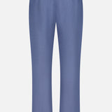 Back view of the Ralph Lauren Purple Label Silk Linen Dorset Flat Front Trouser in blue, featuring an elastic waistband, straight legs, and two buttoned back pockets.