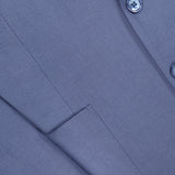 A close-up of the Ralph Lauren Purple Label Silk Linen Single Breasted Sportcoat shows a matching blue front pocket, sleeve with four buttons, and two front buttons.