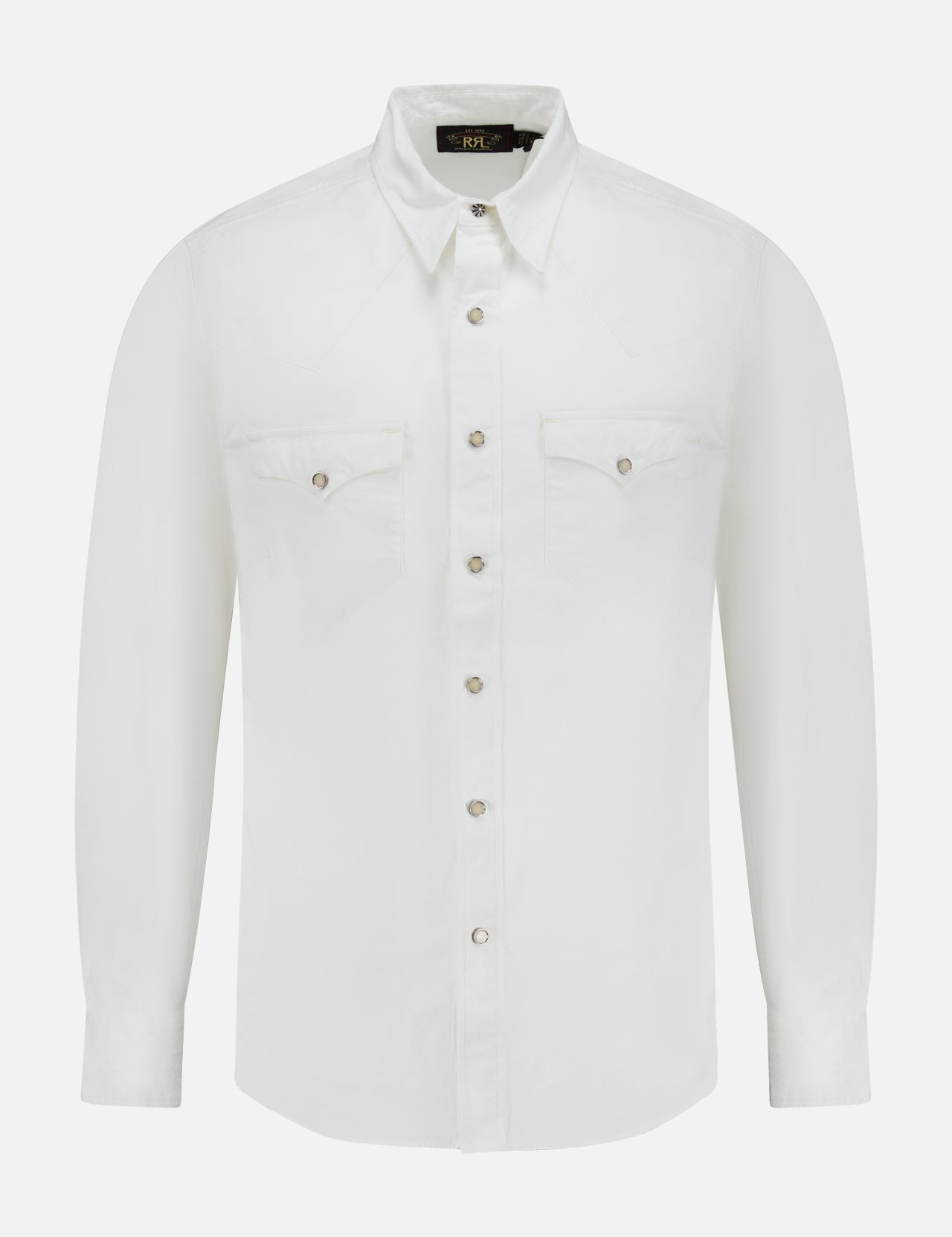 The RALPH LAUREN RRL Cotton Poplin Buffalo Western Workshirt is a white, long-sleeve button-up with two chest pockets, buttoned flaps, and a pointed collar, made from crisp cotton poplin and shown on a plain white background.