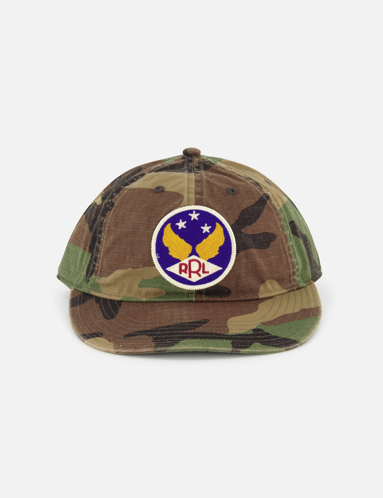 The RALPH LAUREN RRL Cotton Ripstop Printed Camo Ball Hat features a vintage look with a round patch of yellow birds, three stars, "RRL" in red on blue and white, and an adjustable back strap for the perfect fit.