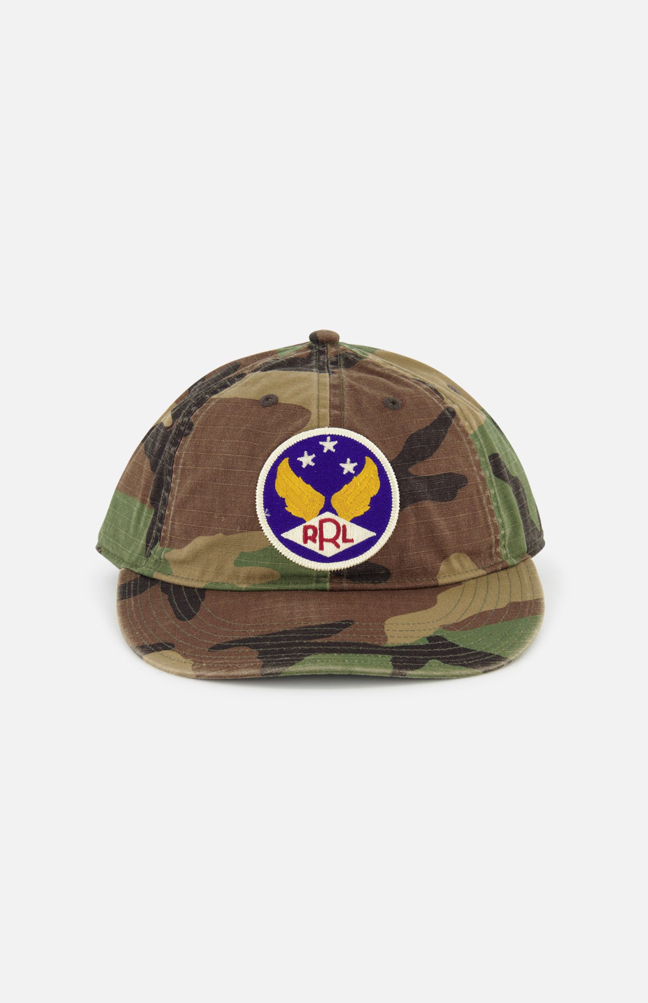 The RALPH LAUREN RRL Cotton Ripstop Printed Camo Ball Hat features a vintage look with a round patch of yellow birds, three stars, "RRL" in red on blue and white, and an adjustable back strap for the perfect fit.
